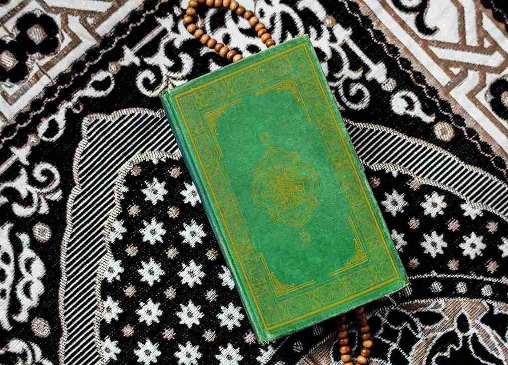 A Picture Of A Green Quran, A Symbol Of The Shahada, A Testament Of Faith