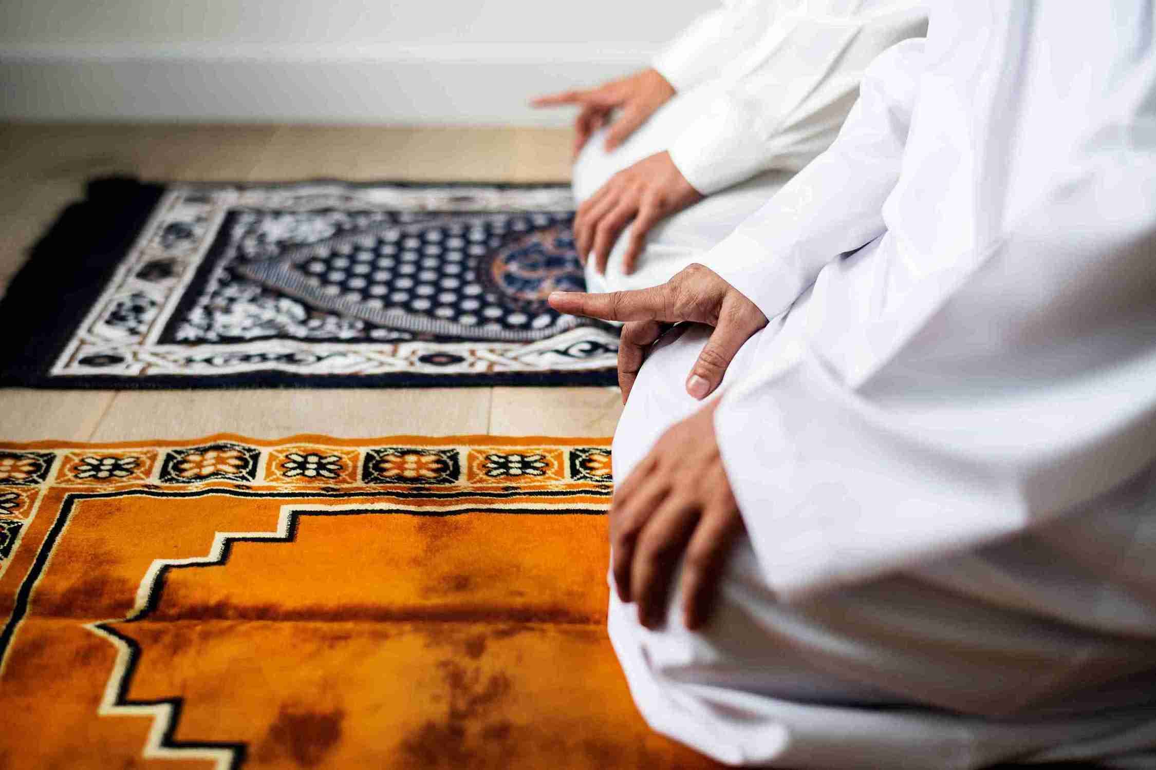 A Picture Of A Man Praying, A Symbol Of The Everlasting Devotion Of Islam